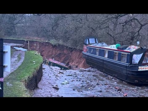 Canal breach swallows boat!