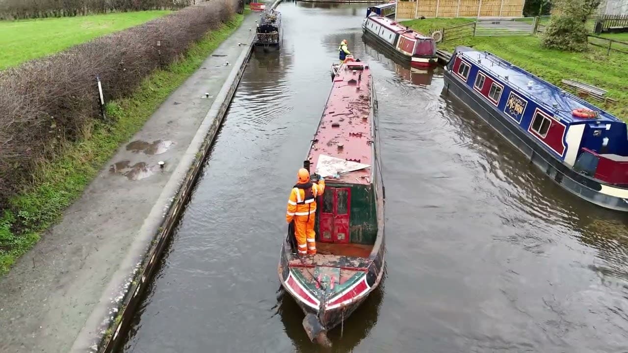 Sefton being towed to her lift - Whitchurch Breach