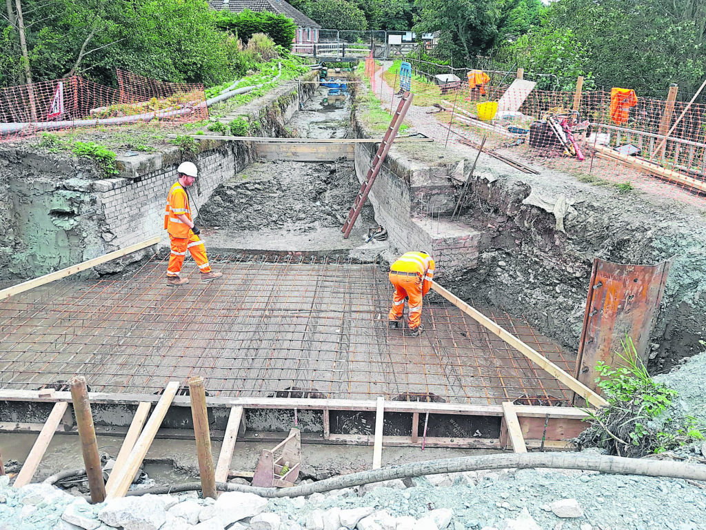 AQUEDUCT WORK: Boosts Canal Restoration