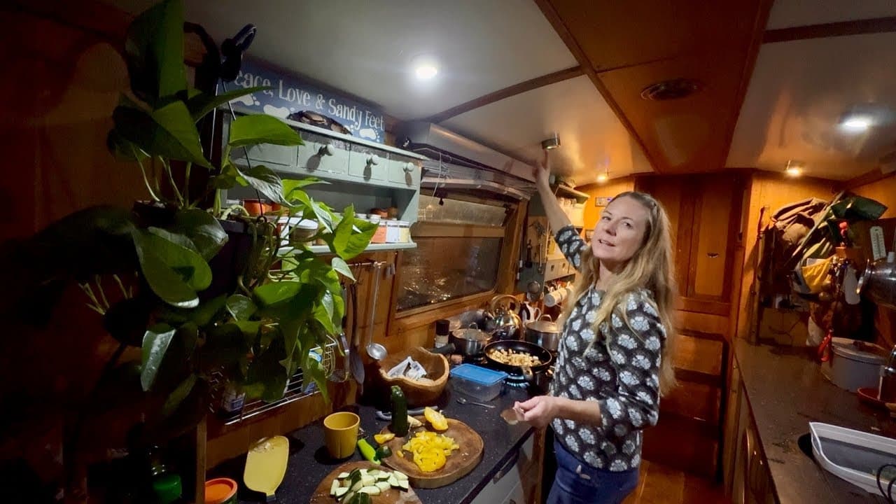 A Woman and Her Dog Hide From a Wind Storm in a British Narrowboat Home #257