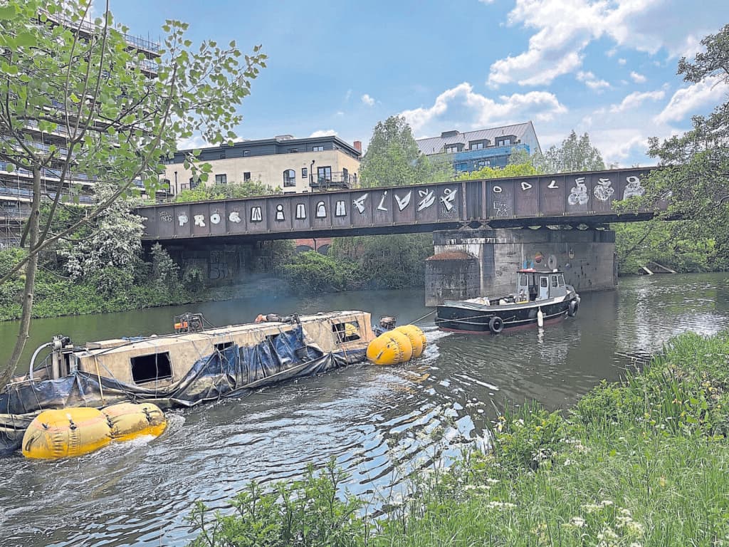 SUNKEN BOAT recovery cost pursued by council