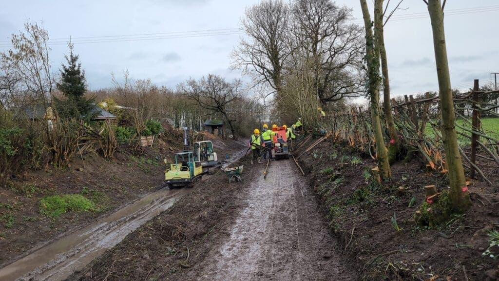 Mud, grit and hedge-laying spirit: volunteers push canal restoration forward